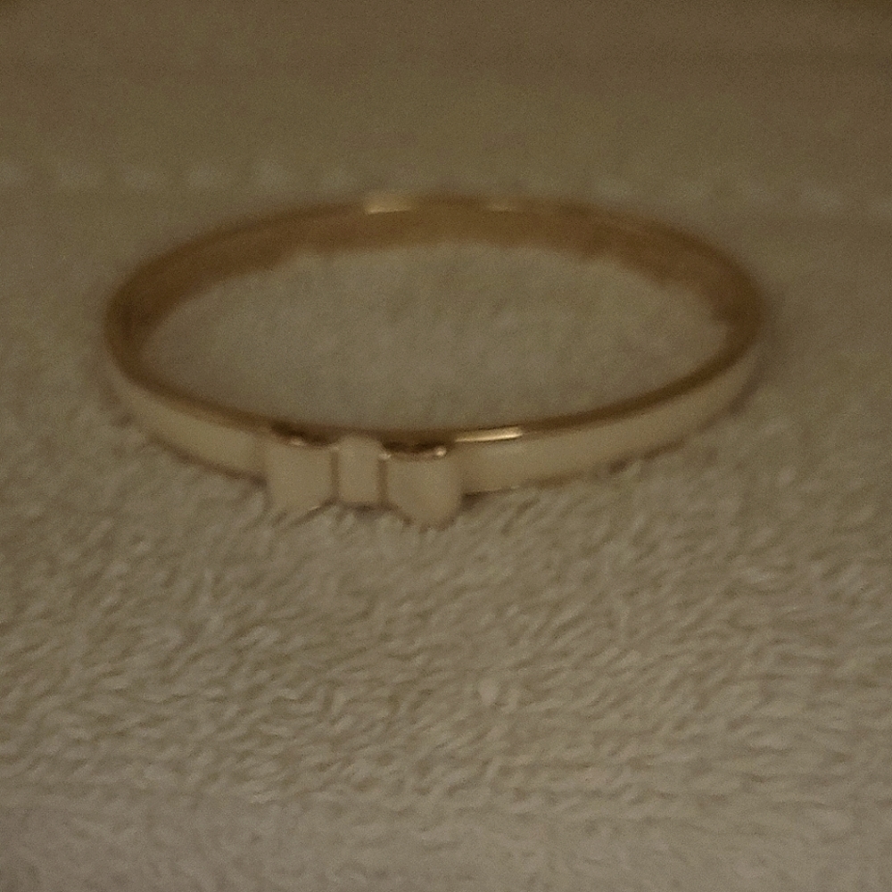 Kate Spade bowtie bracelet. Gold